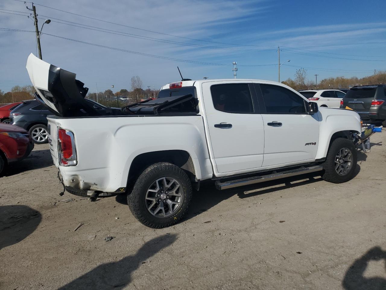 2021 GMC Canyon VIN 1GTG6FEN8M1196239 Copart auction photo, rear end / minor dent/scratches damage thumbnail 3