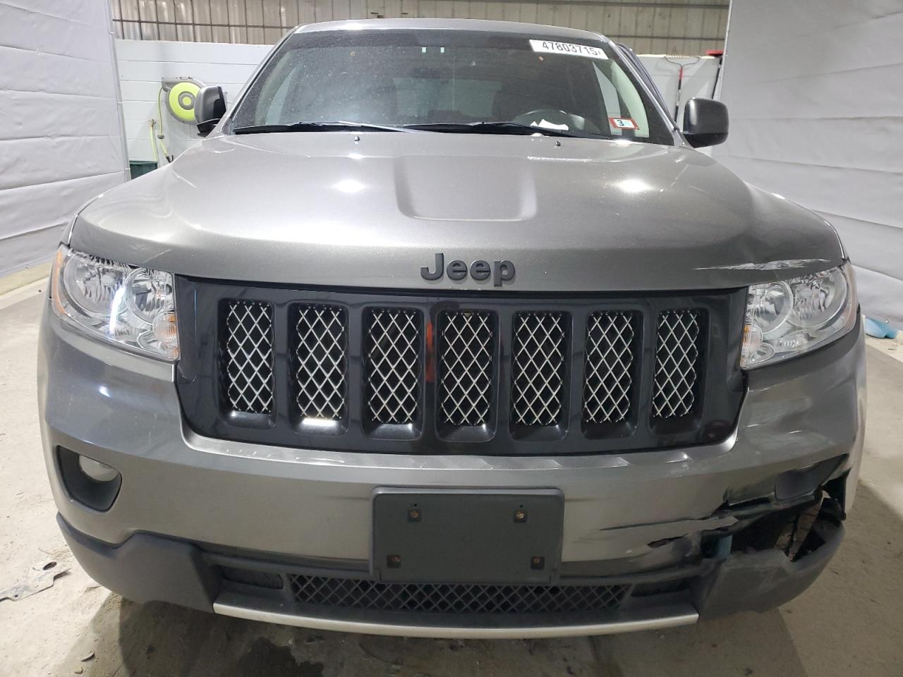 2012 Jeep Grand Cherokee VIN 1C4RJFAT4CC353523 Copart auction photo, front end / side damage thumbnail 5