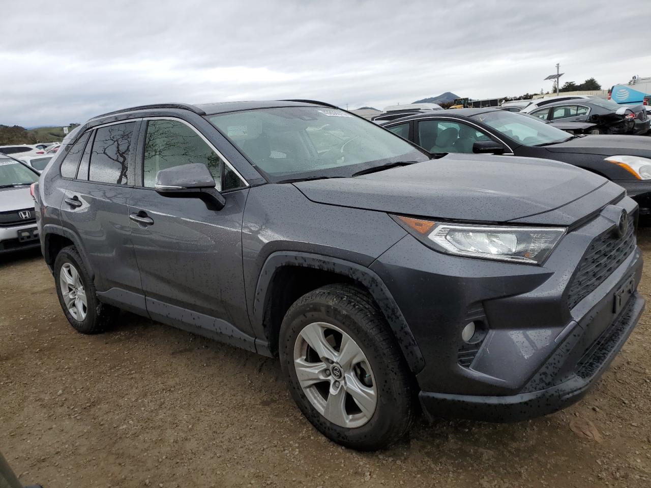 2019 Toyota RAV 4 VIN JTMW1RFVXKD027944 Copart auction photo, side / rear end damage thumbnail 4