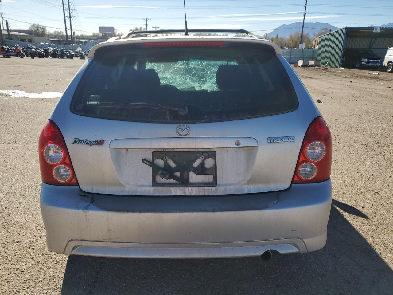2002 Mazda Protege VIN JM1BJ245X21631150 Copart auction photo, front end / side damage thumbnail 6