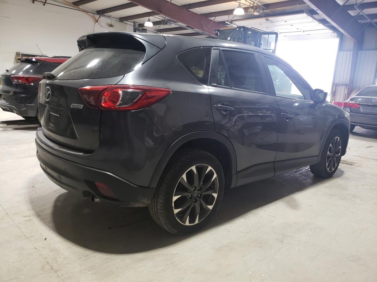 2016 Mazda CX-5 VIN JM3KE4DY4G0655152 Copart auction photo, rear end / side damage thumbnail 3