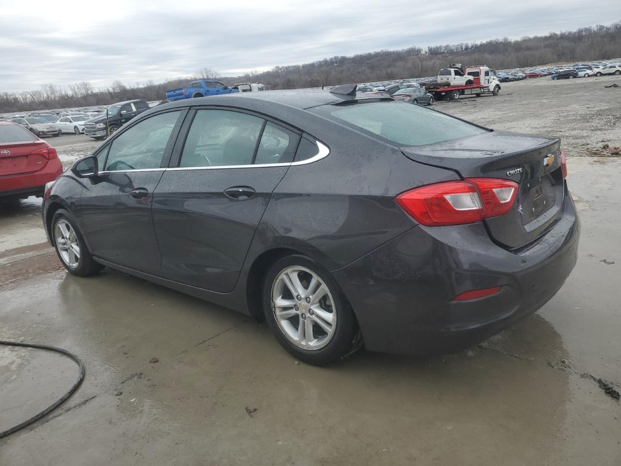 2017 Chevrolet Cruze VIN 1G1BE5SM1H7213980 Copart auction photo, side / rear end damage thumbnail 2