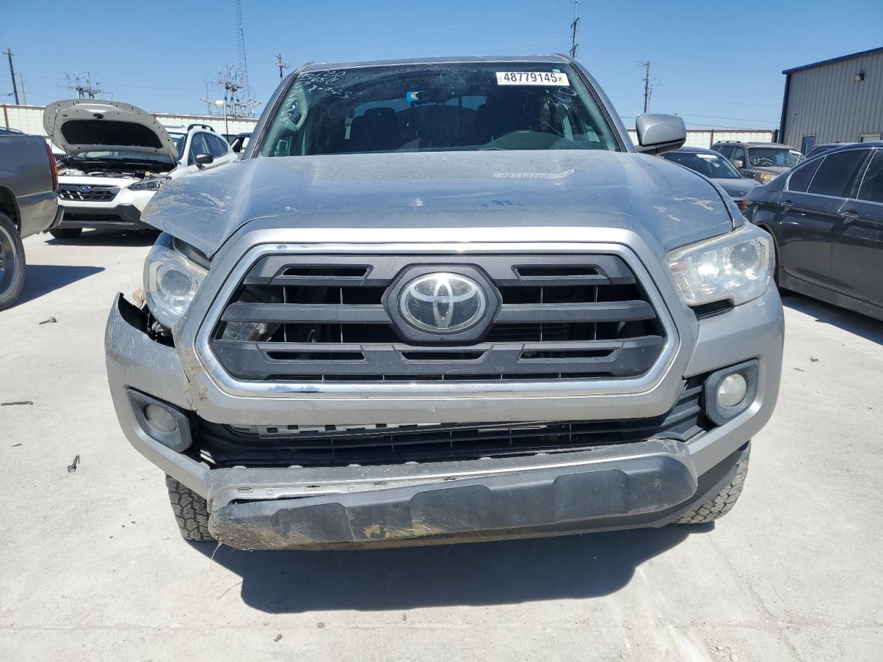 2019 Toyota Tacoma VIN 5TFCZ5AN4KX199736 Copart auction photo, front end / rear end damage thumbnail 5