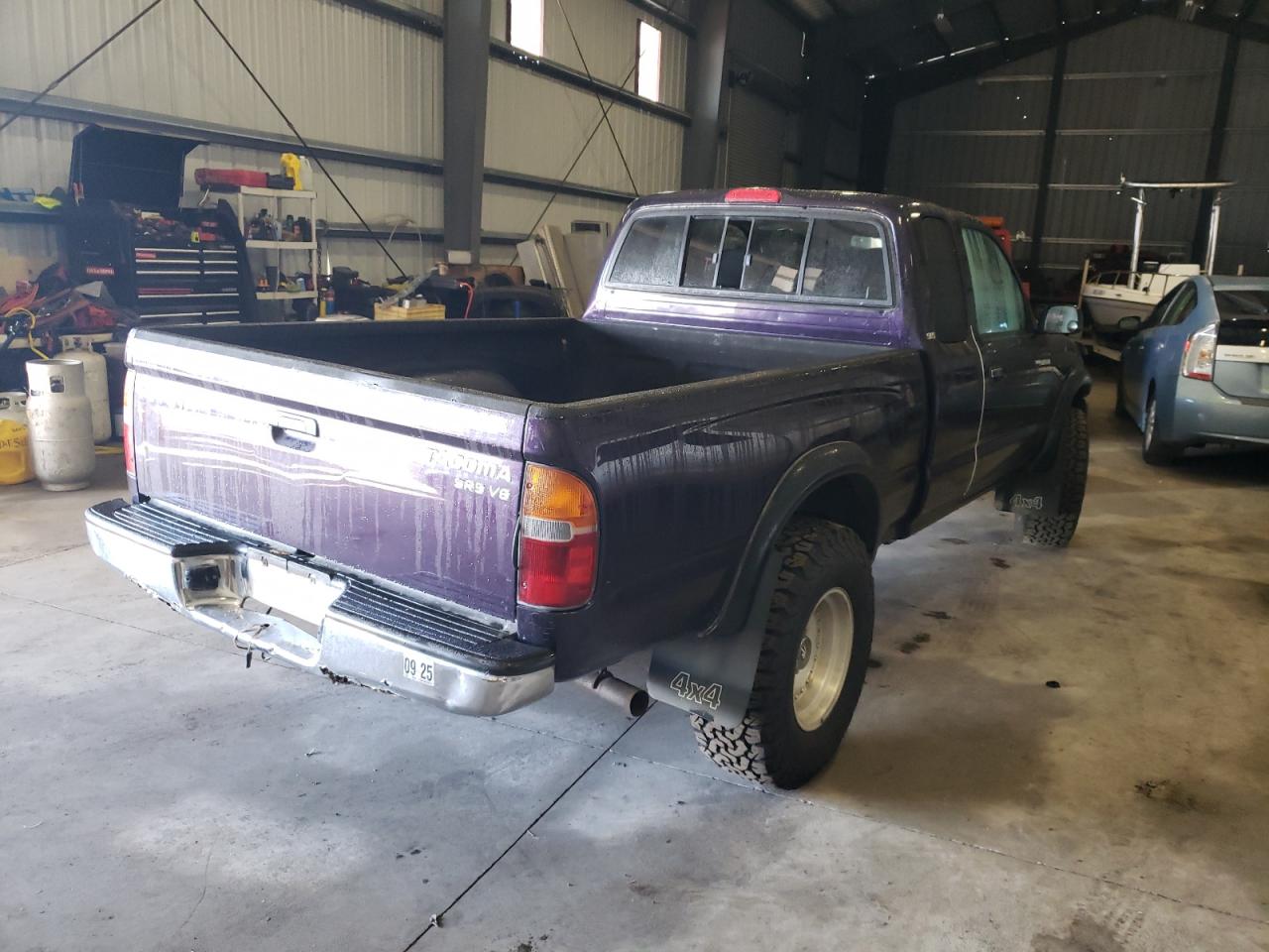 1999 Toyota Tacoma VIN 4TAWN72N8XZ569712 Copart auction photo, all over damage thumbnail 3