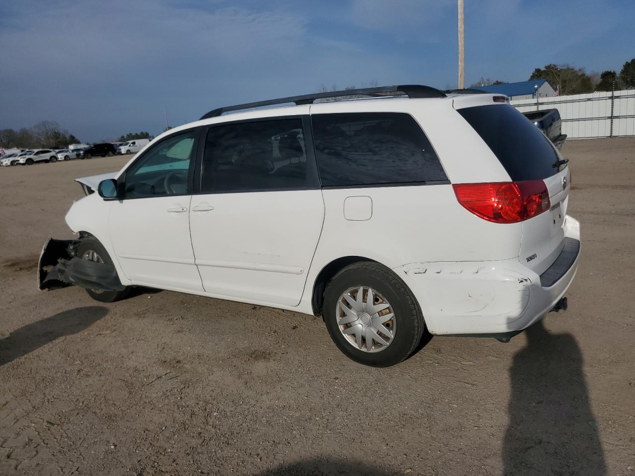 2010 Toyota Sienna VIN 5TDKK4CC4AS340444 Copart auction photo, front end / all over damage thumbnail 2