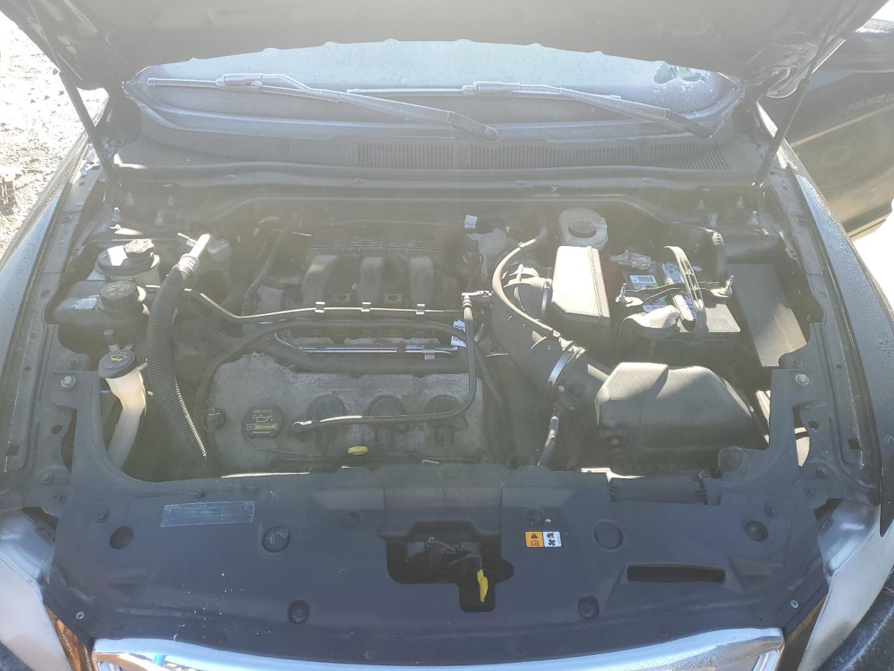 2012 Ford Taurus VIN 1FAHP2EW3CG100232 Copart auction photo, minor dent/scratches damage thumbnail 11