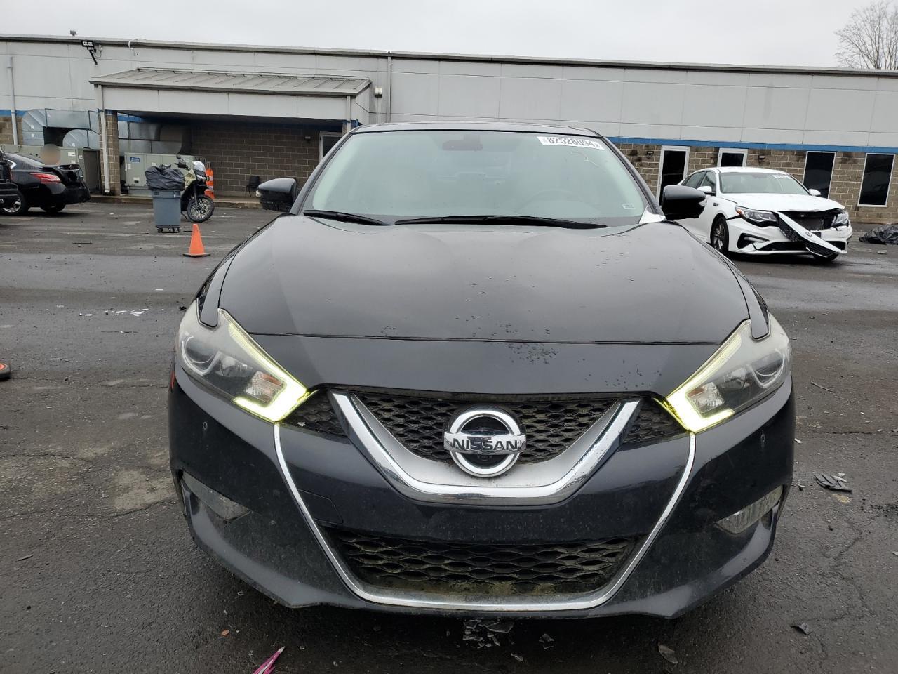 2017 Nissan Maxima VIN 1N4AA6AP2HC413067 Copart auction photo, missing/altered vin / vandalism damage thumbnail 5