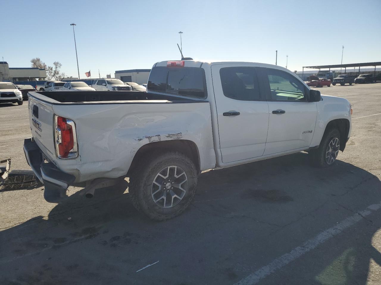 2022 GMC Canyon VIN 1GTG6FEN2N1200285 Copart auction photo, rear end damage thumbnail 3