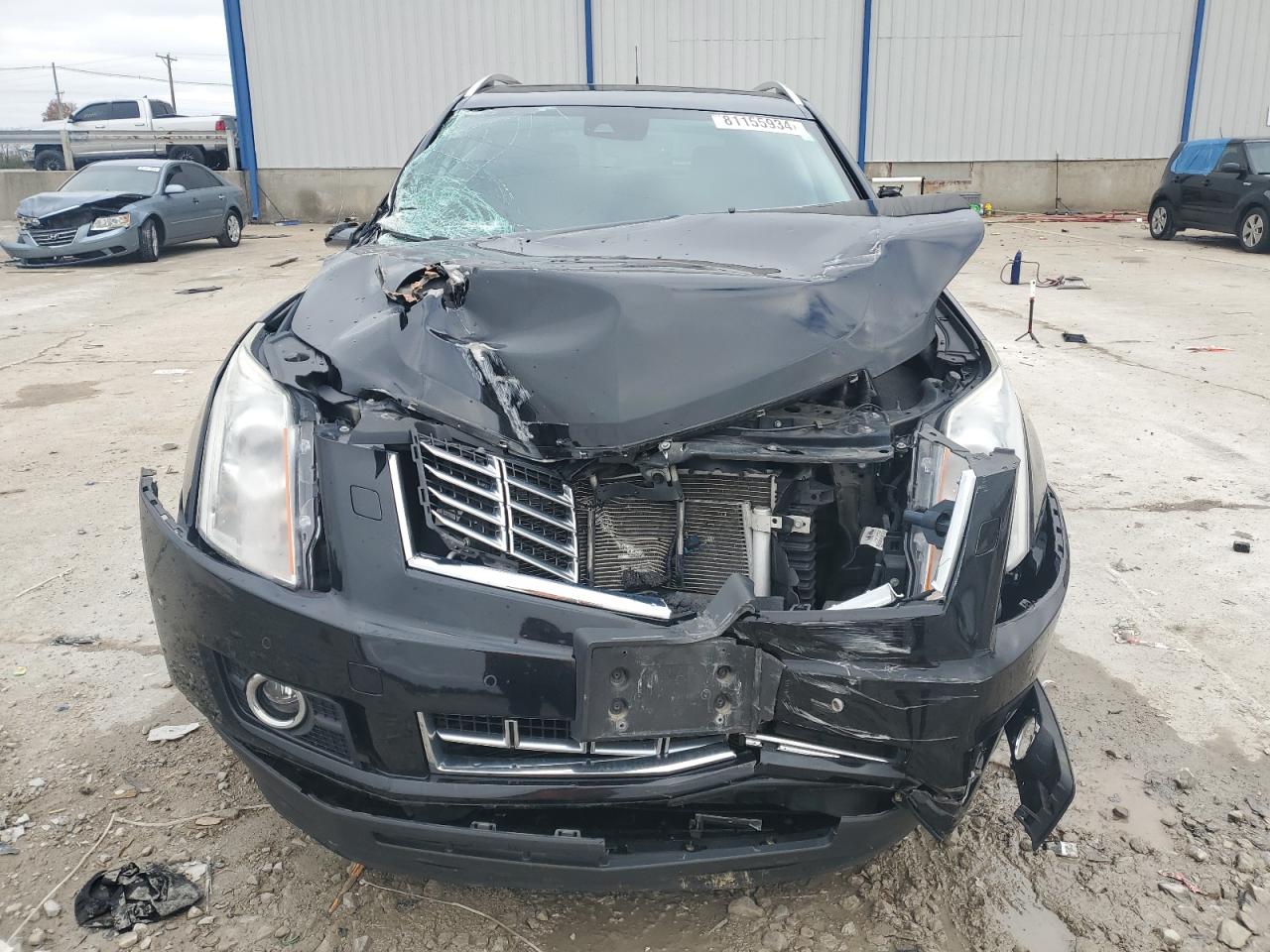 2013 Cadillac SRX VIN 3GYFNDE37DS637708 Copart auction photo, front end / rear end damage thumbnail 5