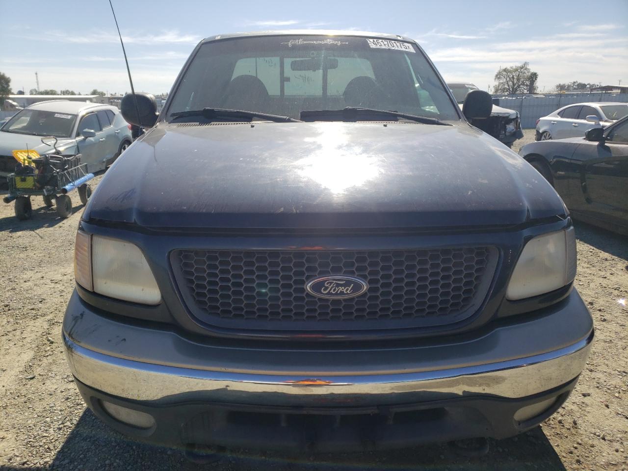 2000 Ford F-150 VIN 1FTRX18W0YKB06899 Copart auction photo, side / rear end damage thumbnail 5