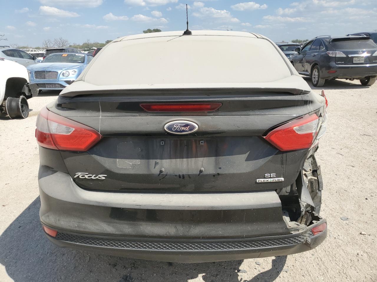 2013 Ford Focus VIN 1FADP3F23DL285116 Copart auction photo, all over damage thumbnail 6