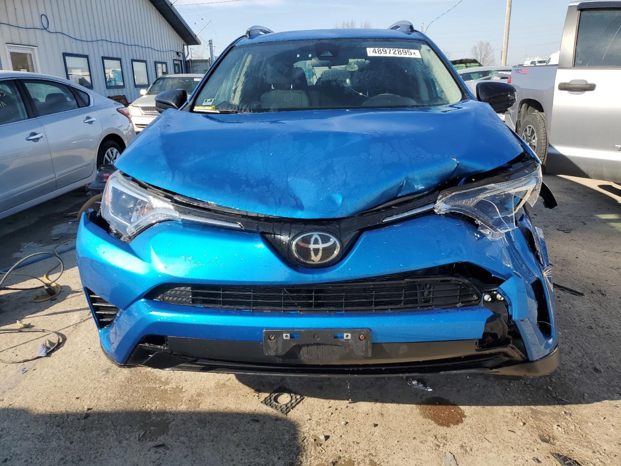 2017 Toyota RAV 4 VIN JTMBFREV0HJ704141 Copart auction photo, front end damage thumbnail 5