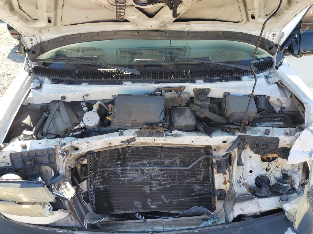 2002 GMC Safari VIN 1GTDM19X12B514880 Copart auction photo, front end damage thumbnail 12
