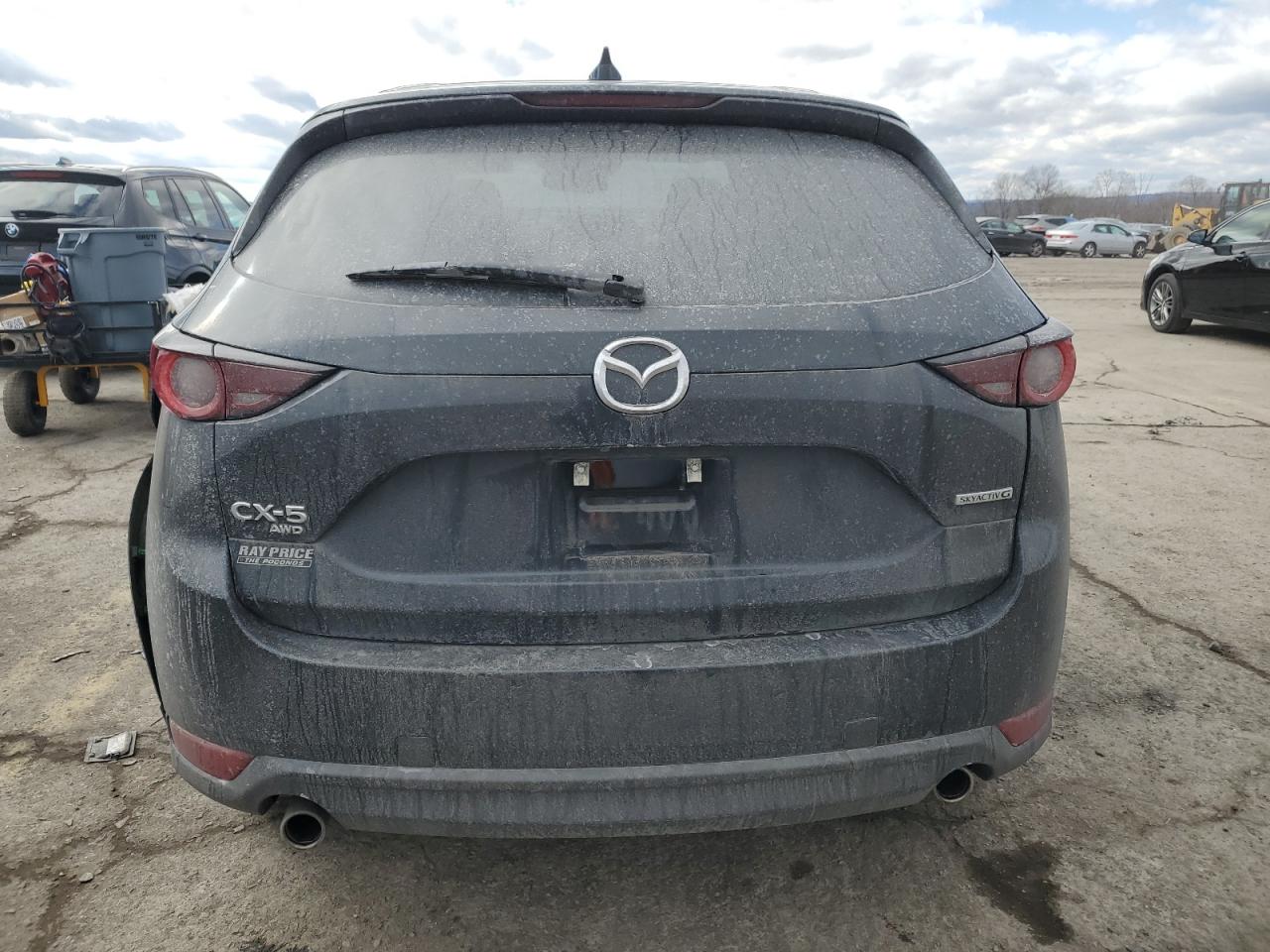 2021 Mazda CX-5 VIN JM3KFBCMXM0318433 Copart auction photo, rear end / side damage thumbnail 6