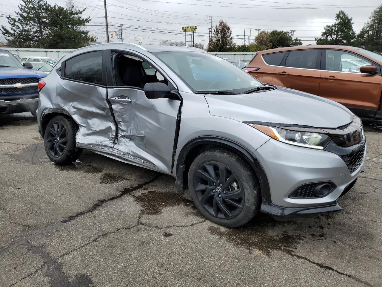 2022 Honda HR-V VIN 3CZRU6H19NM735120 Copart auction photo, side / rear end damage thumbnail 4
