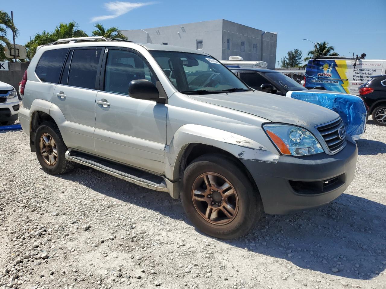 2004 Lexus GX VIN JTJBT20XX40049525 Copart auction photo, front end / side damage thumbnail 4