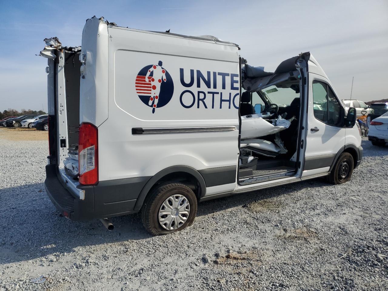 2023 Ford Transit VIN 1FTBR1X84PKB97348 Copart auction photo, all over damage thumbnail 3