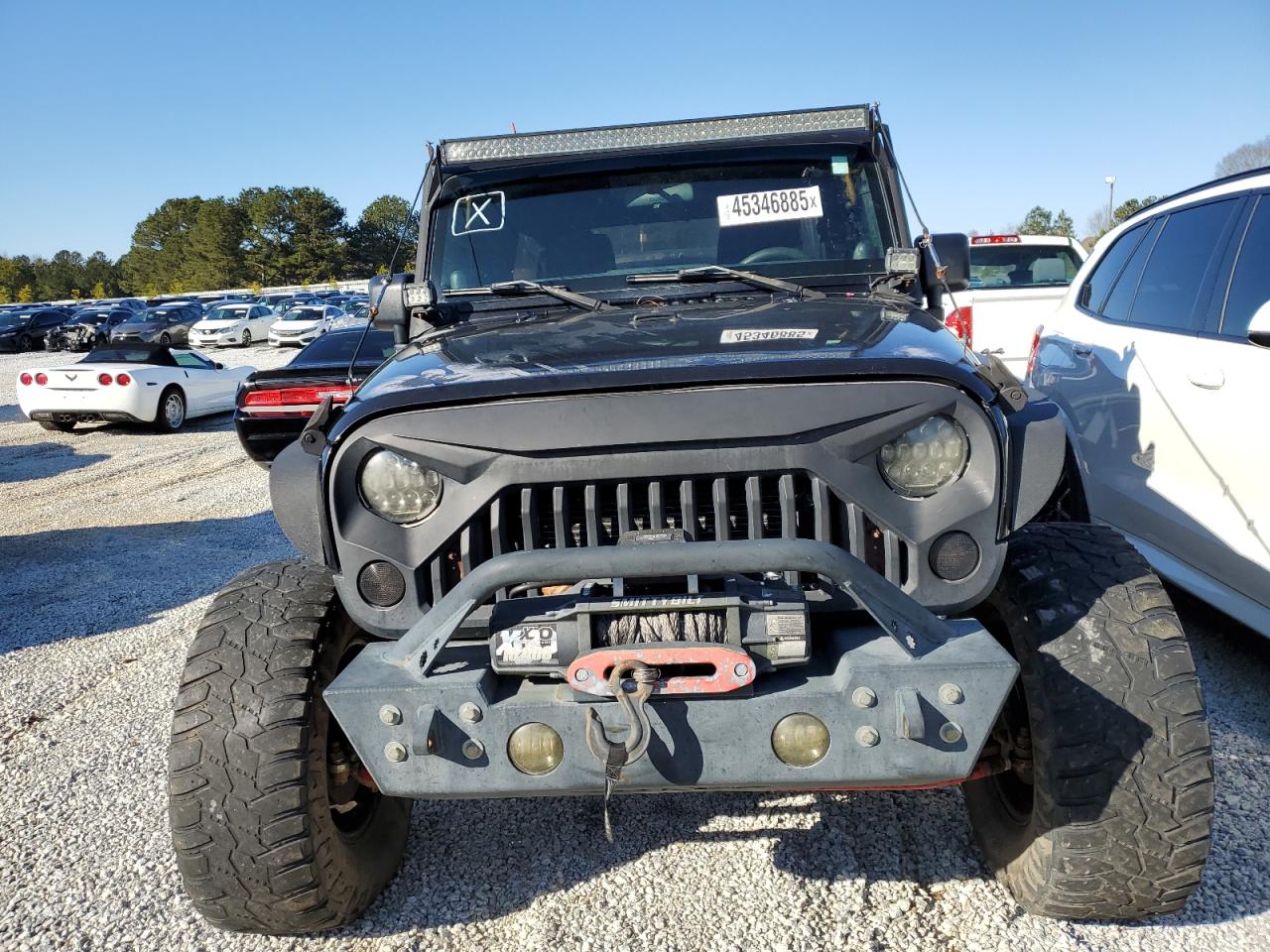 2012 Jeep Wrangler VIN 1C4BJWDG2CL109482 Copart auction photo, minor dent/scratches damage thumbnail 5