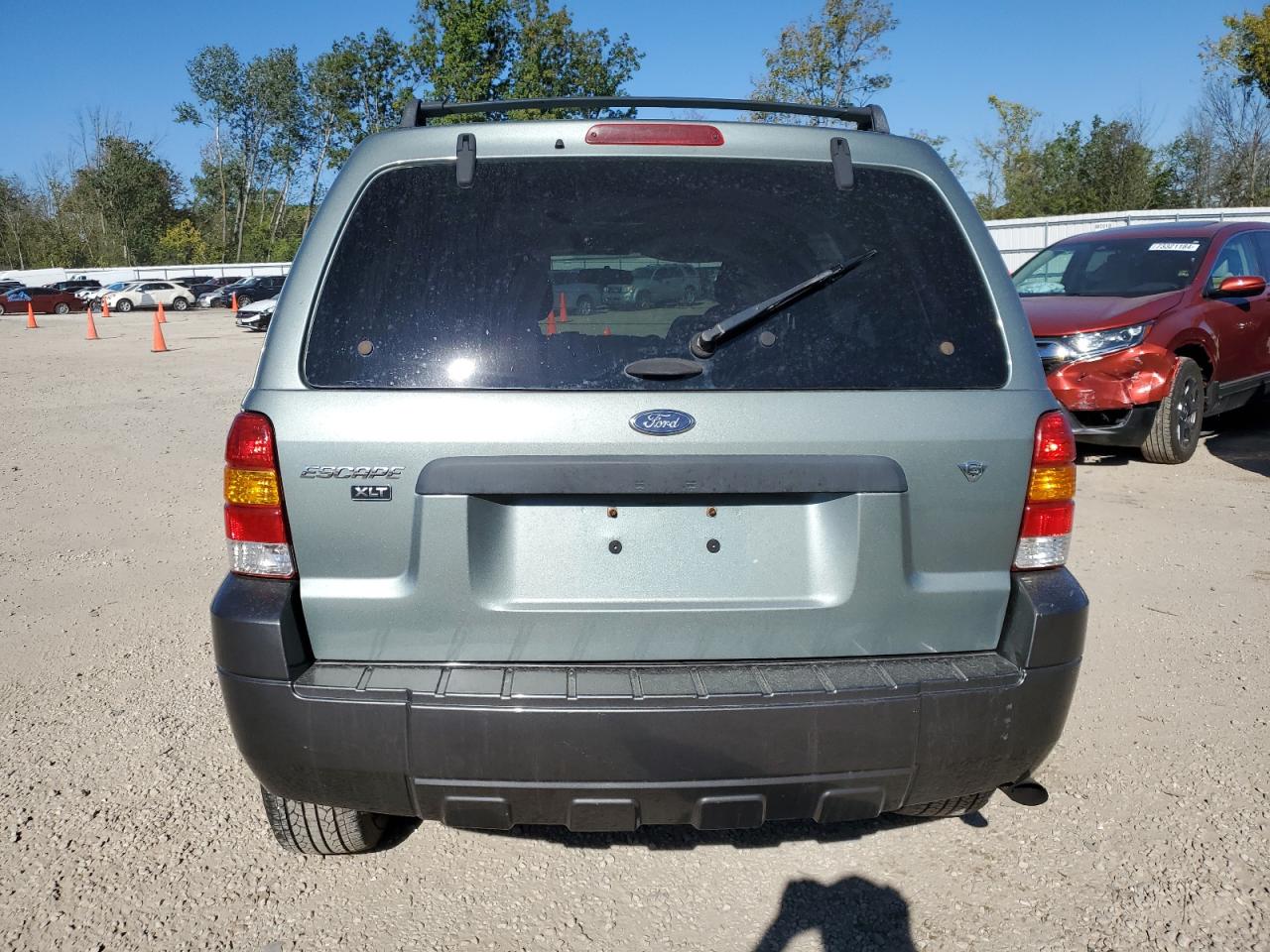 2006 Ford Escape VIN 1FMYU93186KA54963 Copart auction photo, front end / minor dent/scratches damage thumbnail 6