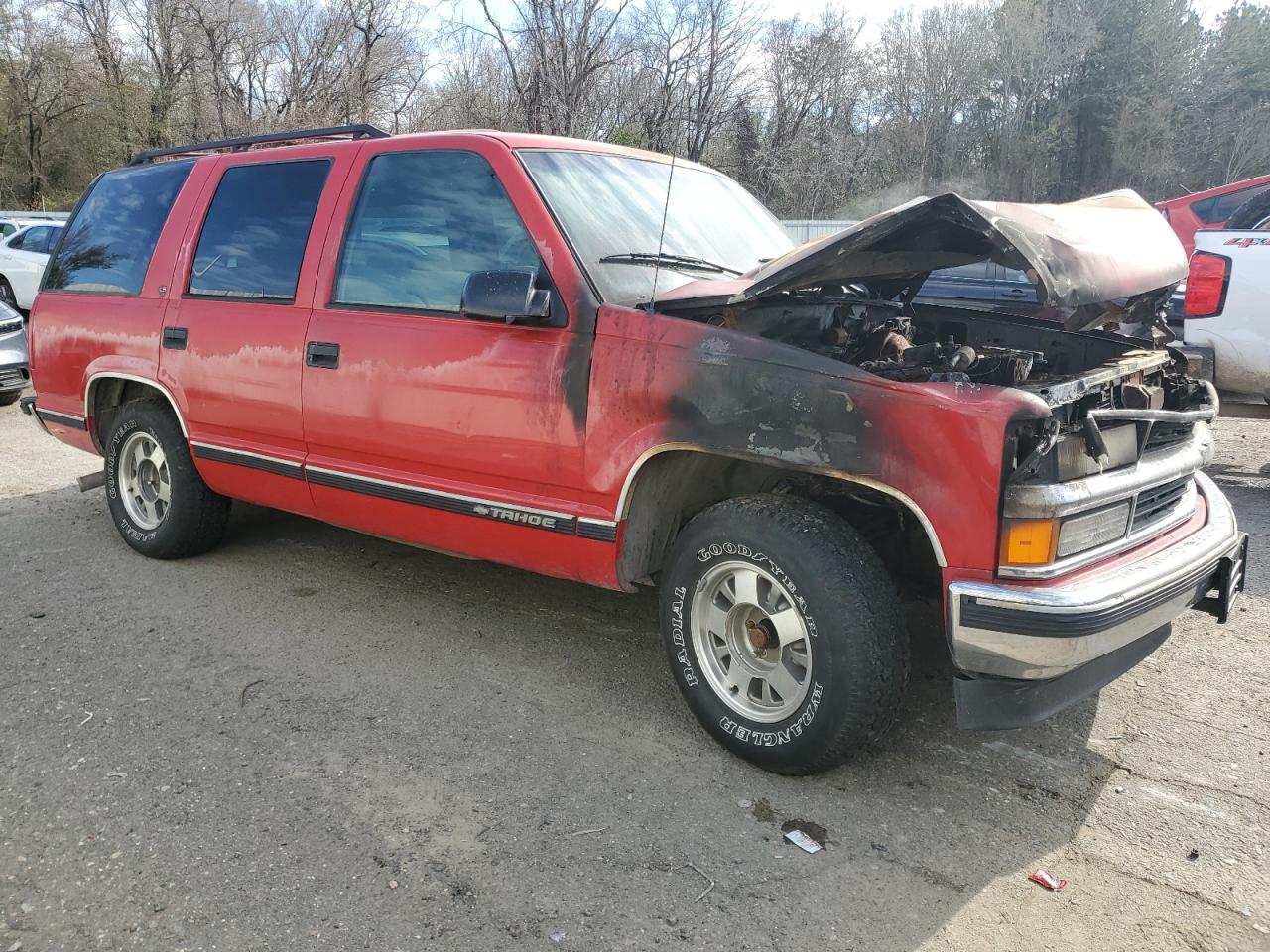 1999 Chevrolet Tahoe VIN 1GNEC13R2XJ355423 Copart auction photo, burn - engine damage thumbnail 4