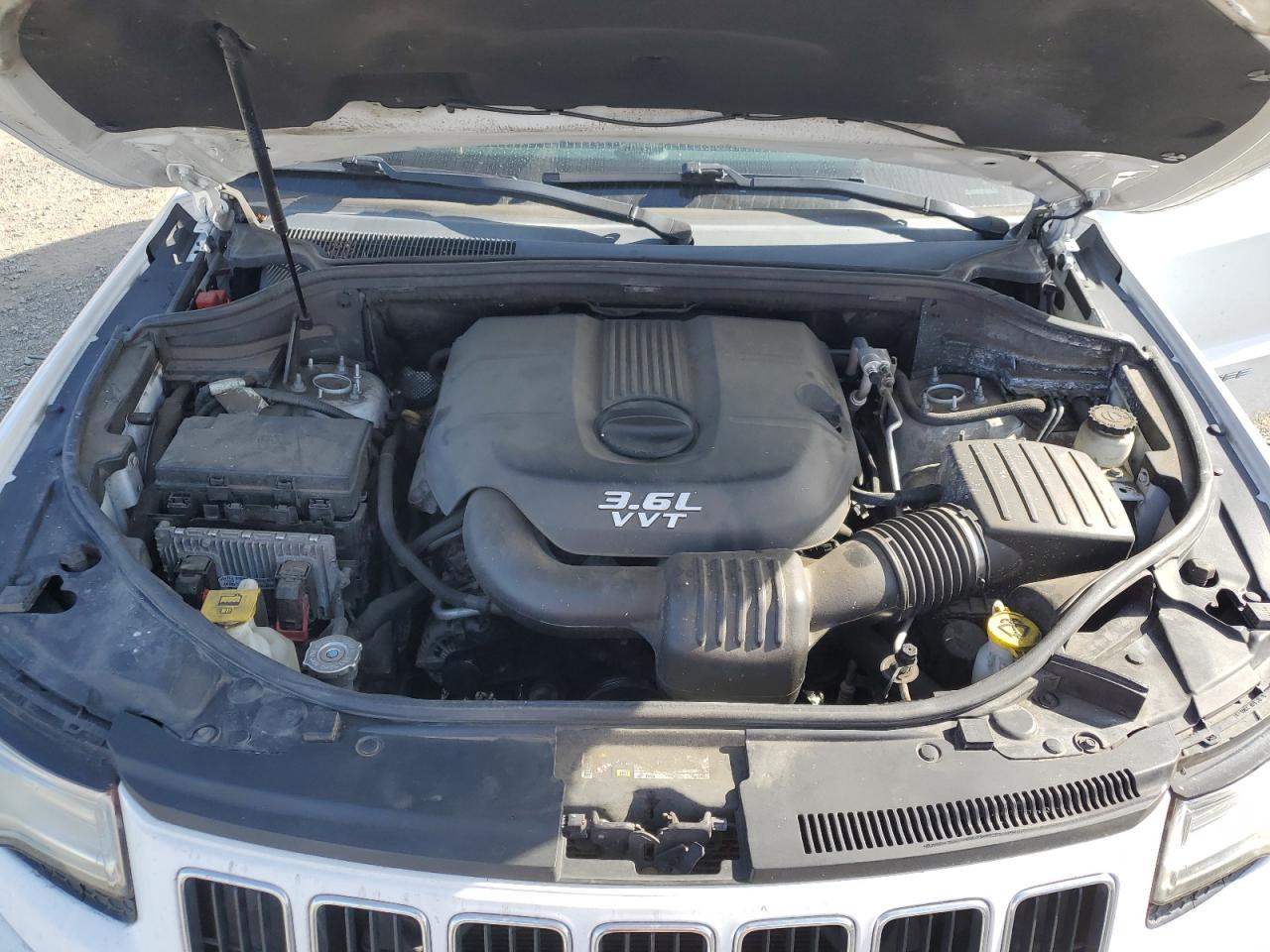 2014 Jeep Grand Cherokee VIN 1C4RJEBG7EC144792 Copart auction photo, rear end / minor dent/scratches damage thumbnail 12