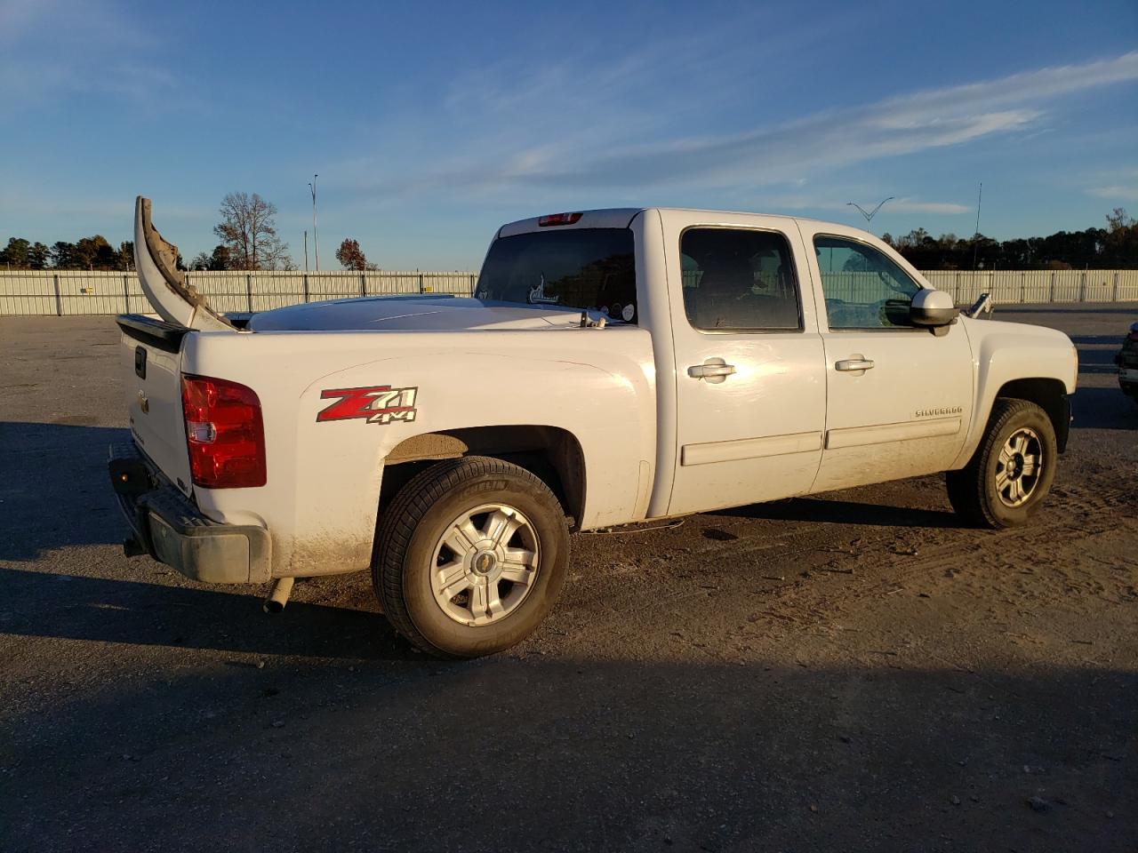 2011 Chevrolet Silverado VIN 3GCPKSE35BG328102 Copart auction photo, front end damage thumbnail 3