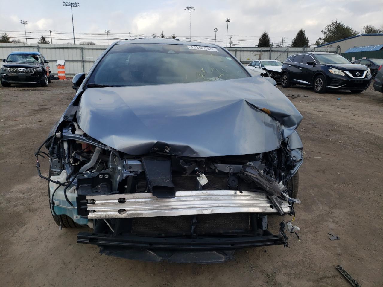 2022 Toyota Corolla VIN JTDM4MCE2NJ098180 Copart auction photo, front end / rear end damage thumbnail 5