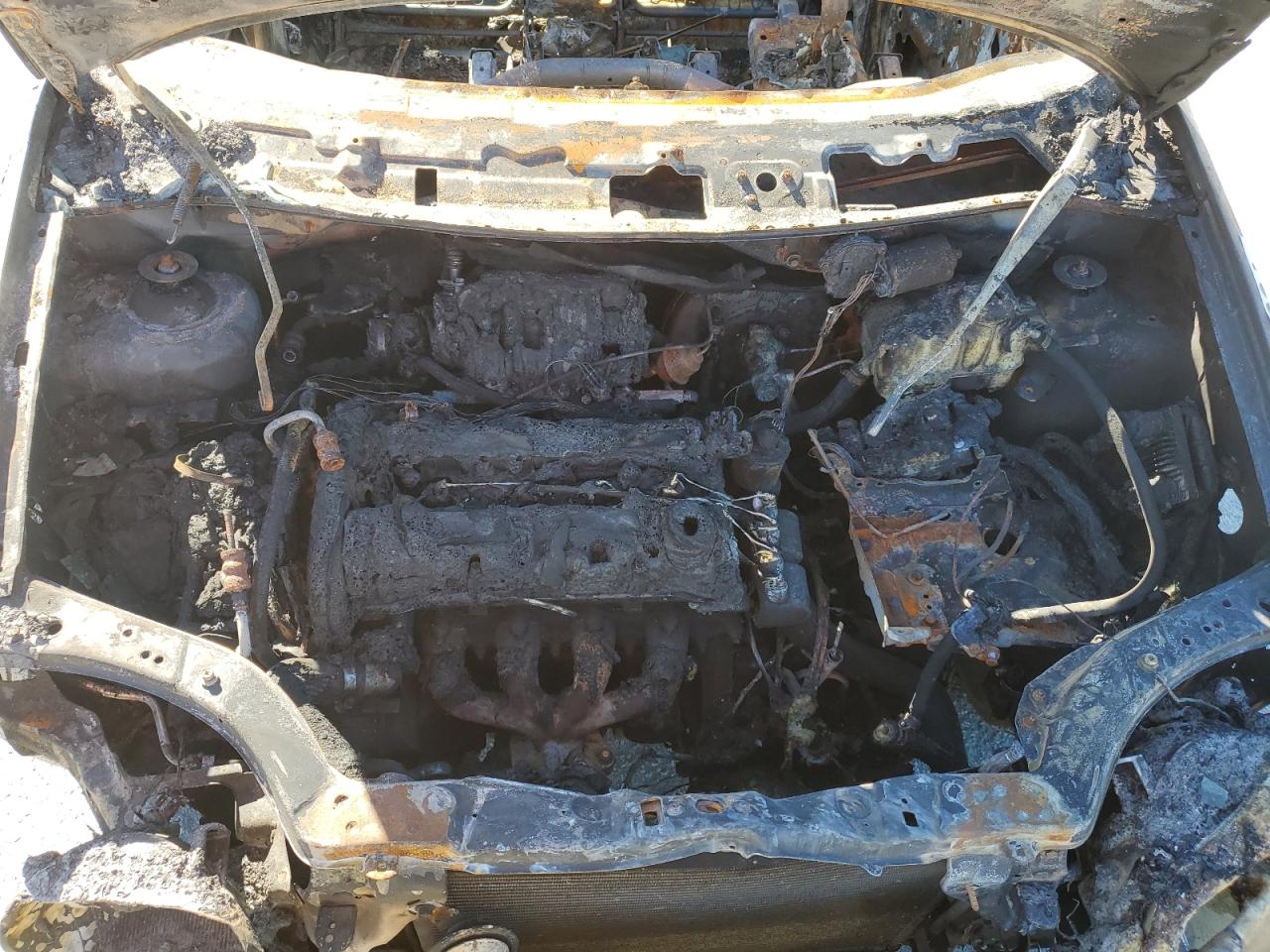 2004 Chevrolet Aveo VIN KL1TD62634B144021 Copart auction photo, burn / front end damage thumbnail 12
