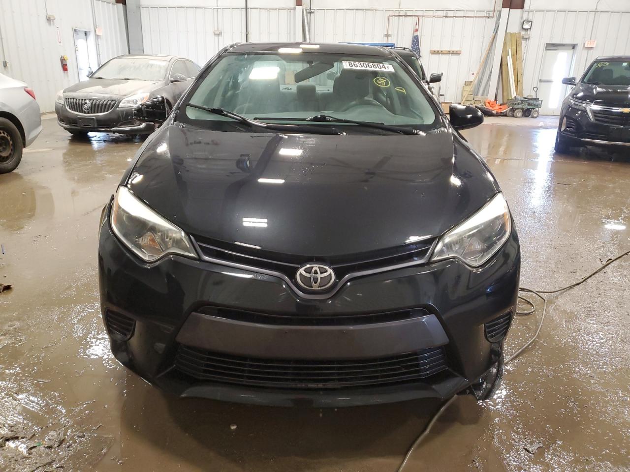 2015 Toyota Corolla VIN 5YFBURHE5FP209654 Copart auction photo, side / front end damage thumbnail 5