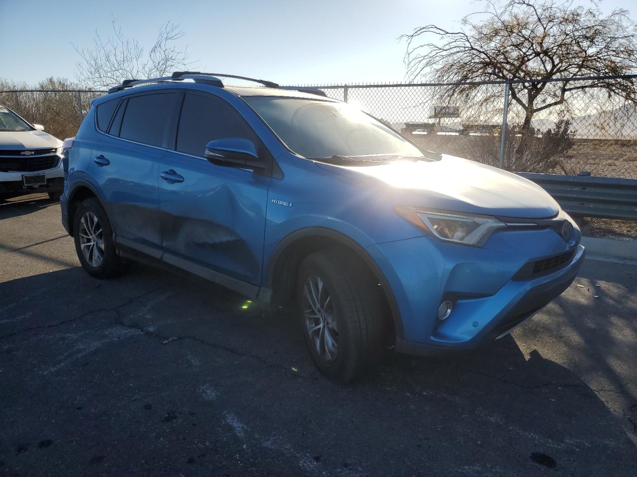 2017 Toyota RAV 4 VIN JTMRJREV8HD080861 Copart auction photo, rear end / side damage thumbnail 4