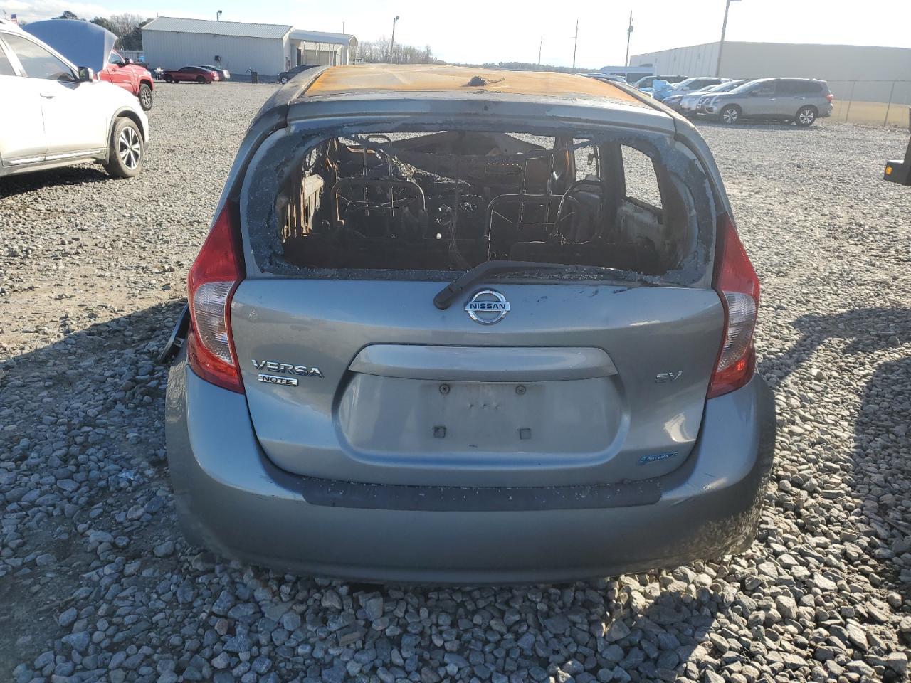 2014 Nissan Versa VIN 3N1CE2CP3EL434168 Copart auction photo, burn damage thumbnail 6