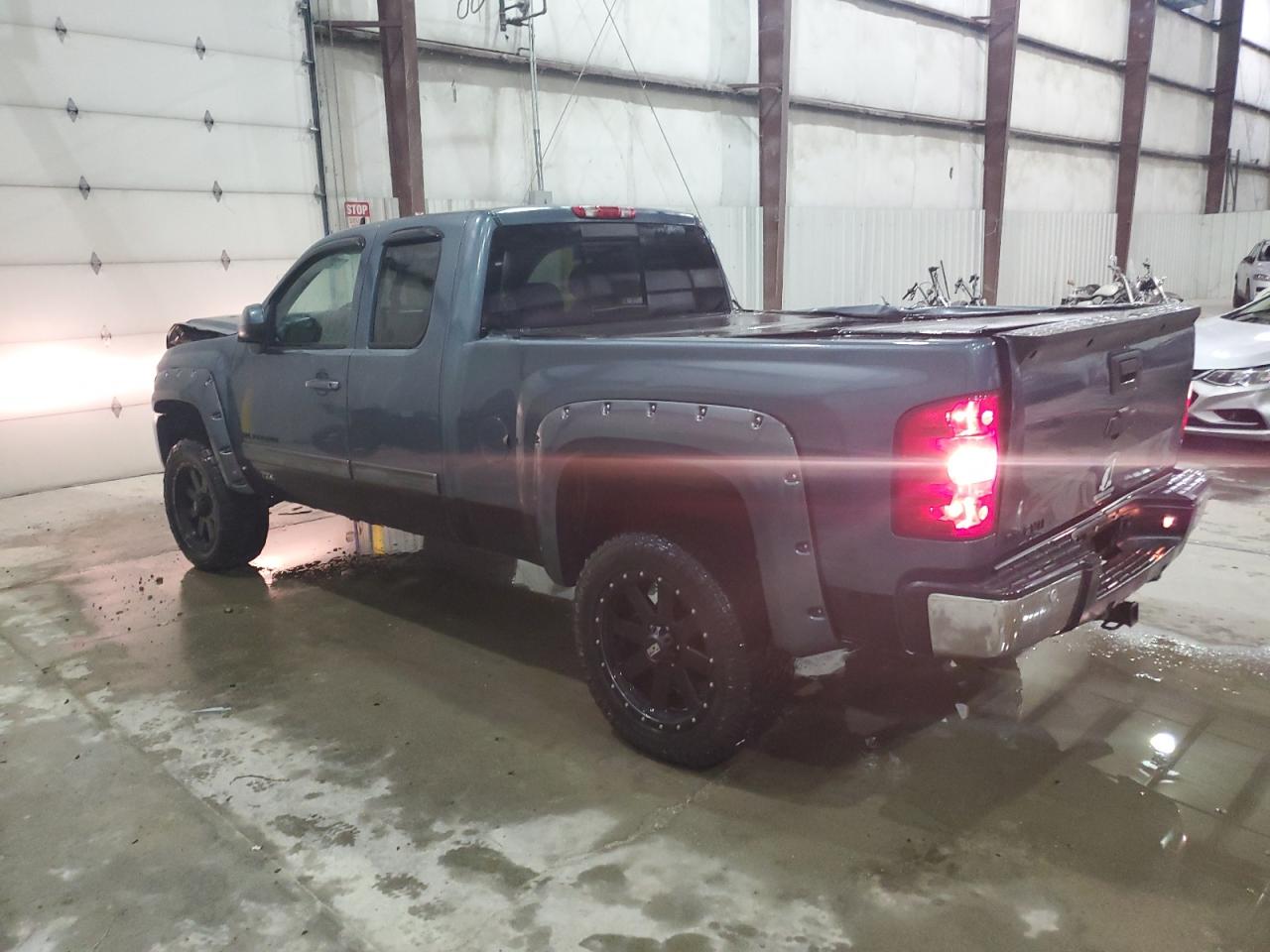 2011 Chevrolet Silverado VIN 1GCRKSE30BZ377314 Copart auction photo, front end / rear end damage thumbnail 2