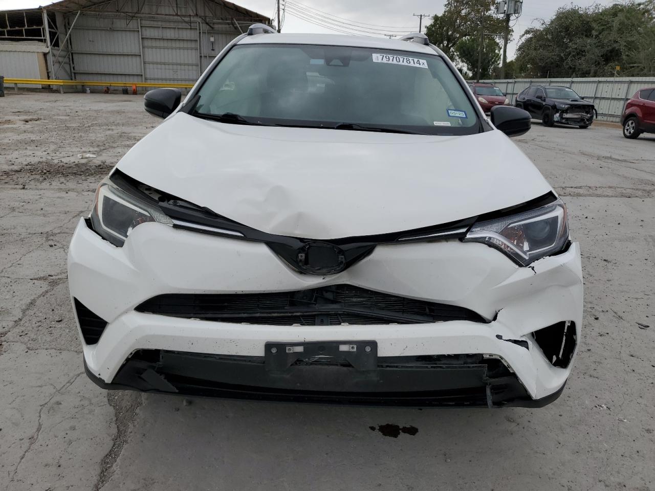 2018 Toyota RAV 4 VIN JTMBFREV7JD257750 Copart auction photo, front end damage thumbnail 5