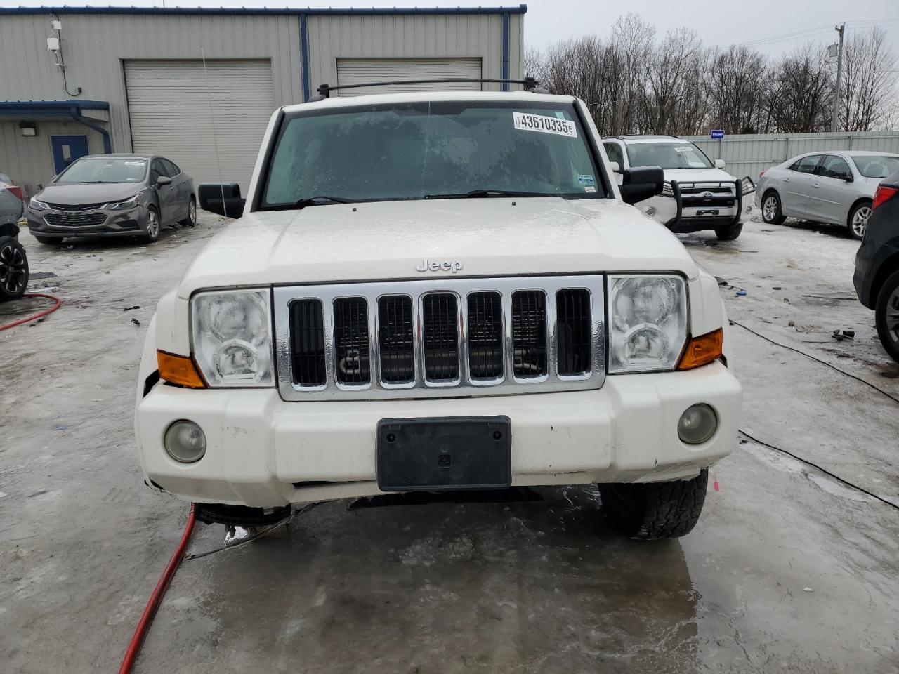 2010 Jeep Commander VIN 1J4RG4GK6AC156779 Copart auction photo, front end damage thumbnail 5
