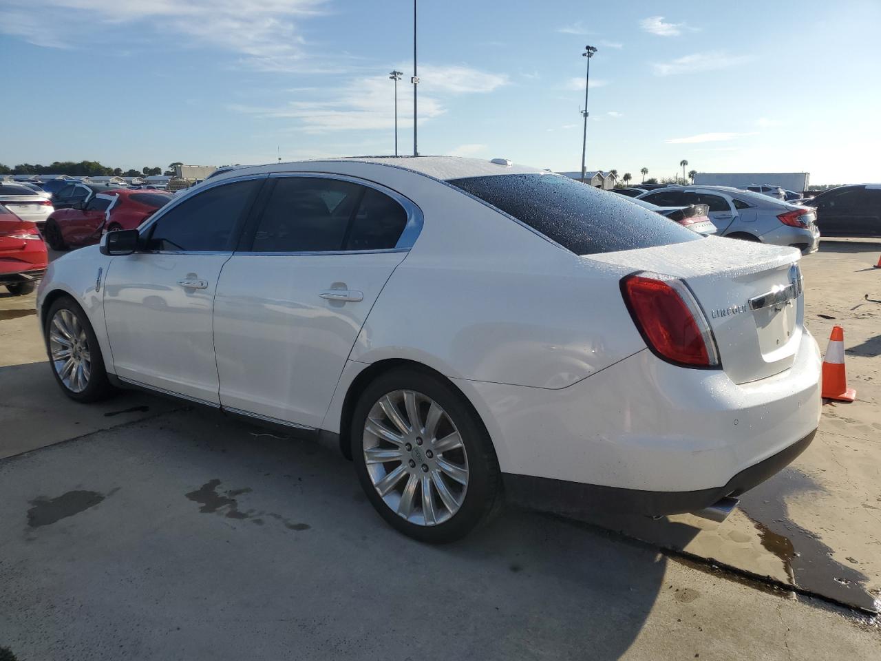 2010 Lincoln MKS VIN 1LNHL9DR9AG607431 Copart auction photo, water/flood damage thumbnail 2