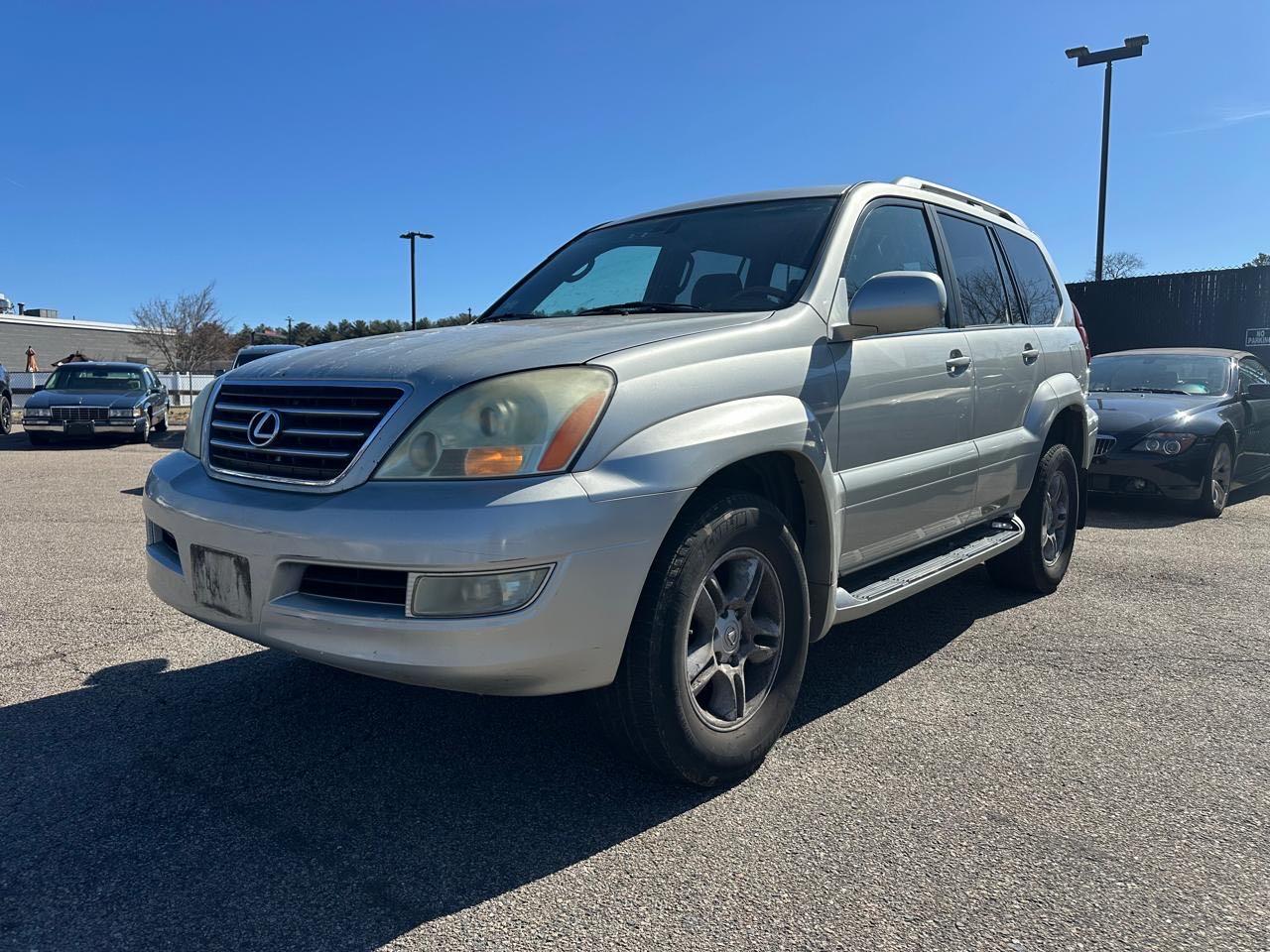 2004 Lexus GX VIN JTJBT20X040052031 Copart auction photo, minor dent/scratches / normal wear damage thumbnail 2