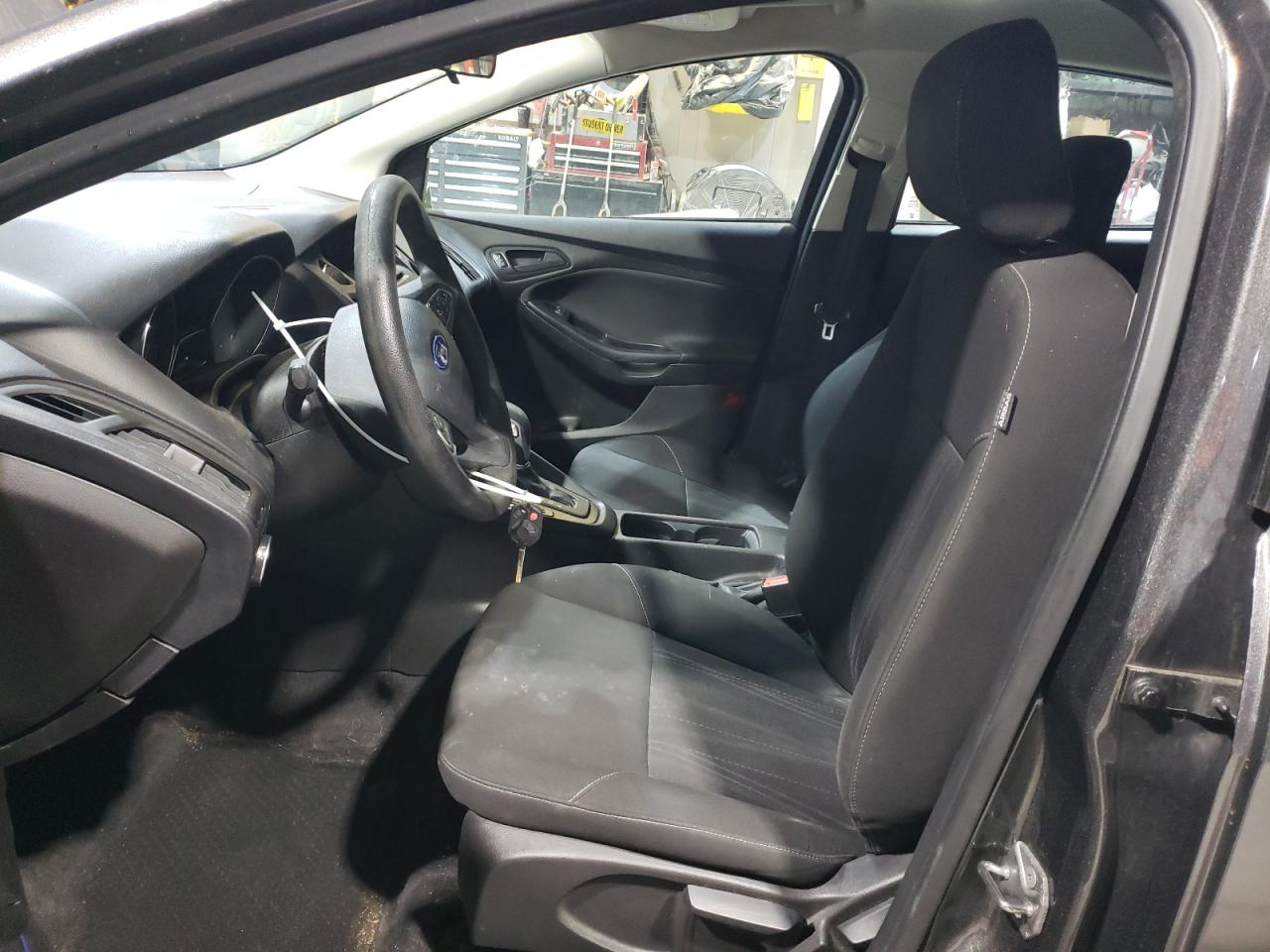 2015 Ford Focus VIN 1FADP3E20FL368748 Copart auction photo, front end / hail damage thumbnail 7