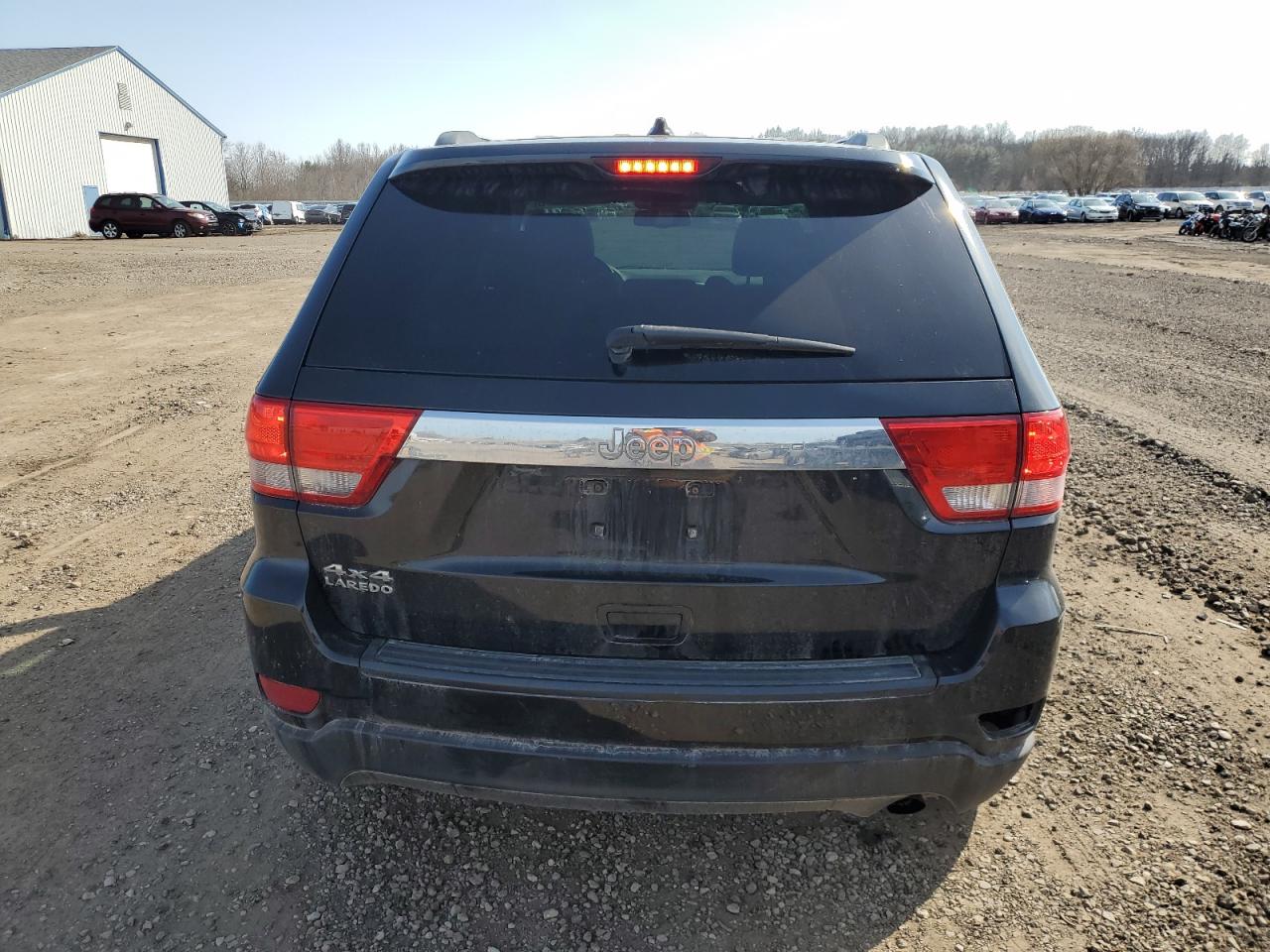 2012 Jeep Grand Cherokee VIN 1C4RJFAG5CC280262 Copart auction photo, side / rear end damage thumbnail 6
