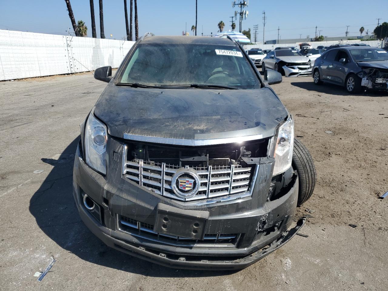 2014 Cadillac SRX VIN 3GYFNCE34ES566317 Copart auction photo, front end / minor dent/scratches damage thumbnail 5