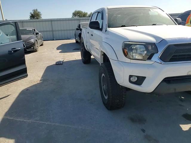 2014 Toyota Tacoma VIN 5TFLU4EN5EX099524 Copart auction photo, side damage thumbnail 11
