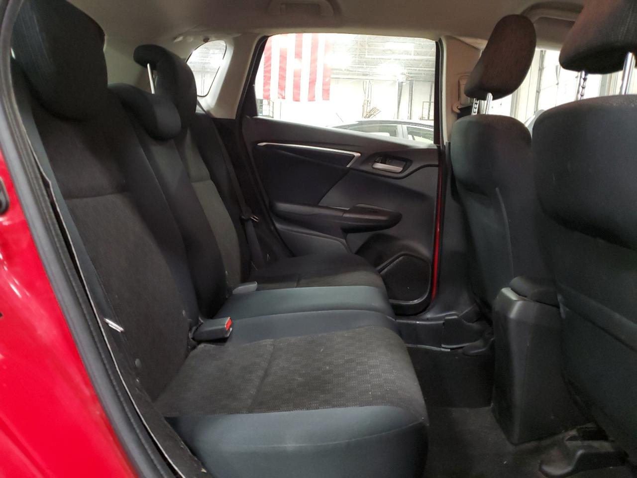 2016 Honda Fit VIN JHMGK5H5XGX021069 Copart auction photo, side damage thumbnail 10