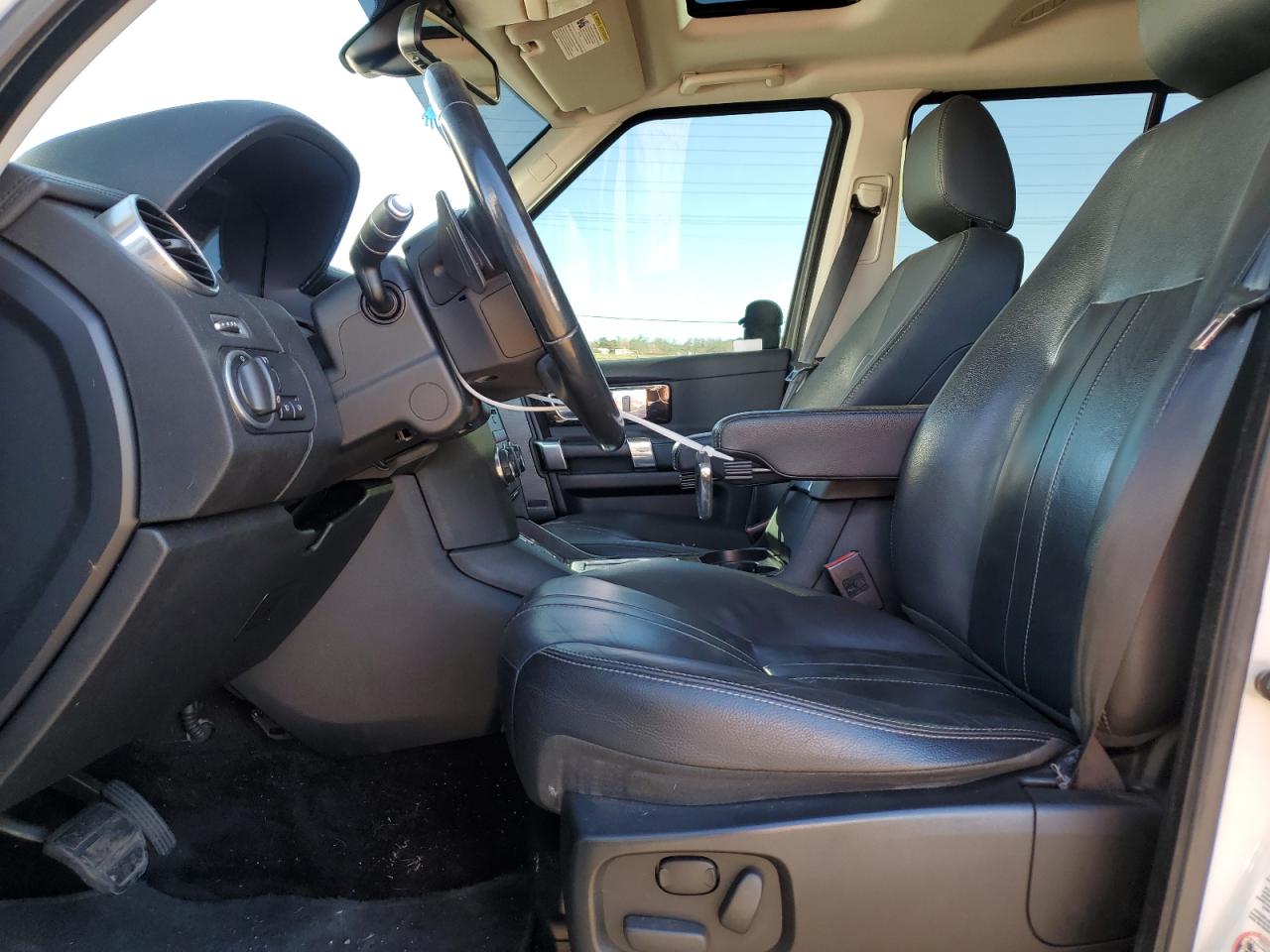 2015 Land Rover LR4 VIN SALAG2V60FA757386 Copart auction photo, side / rear end damage thumbnail 7