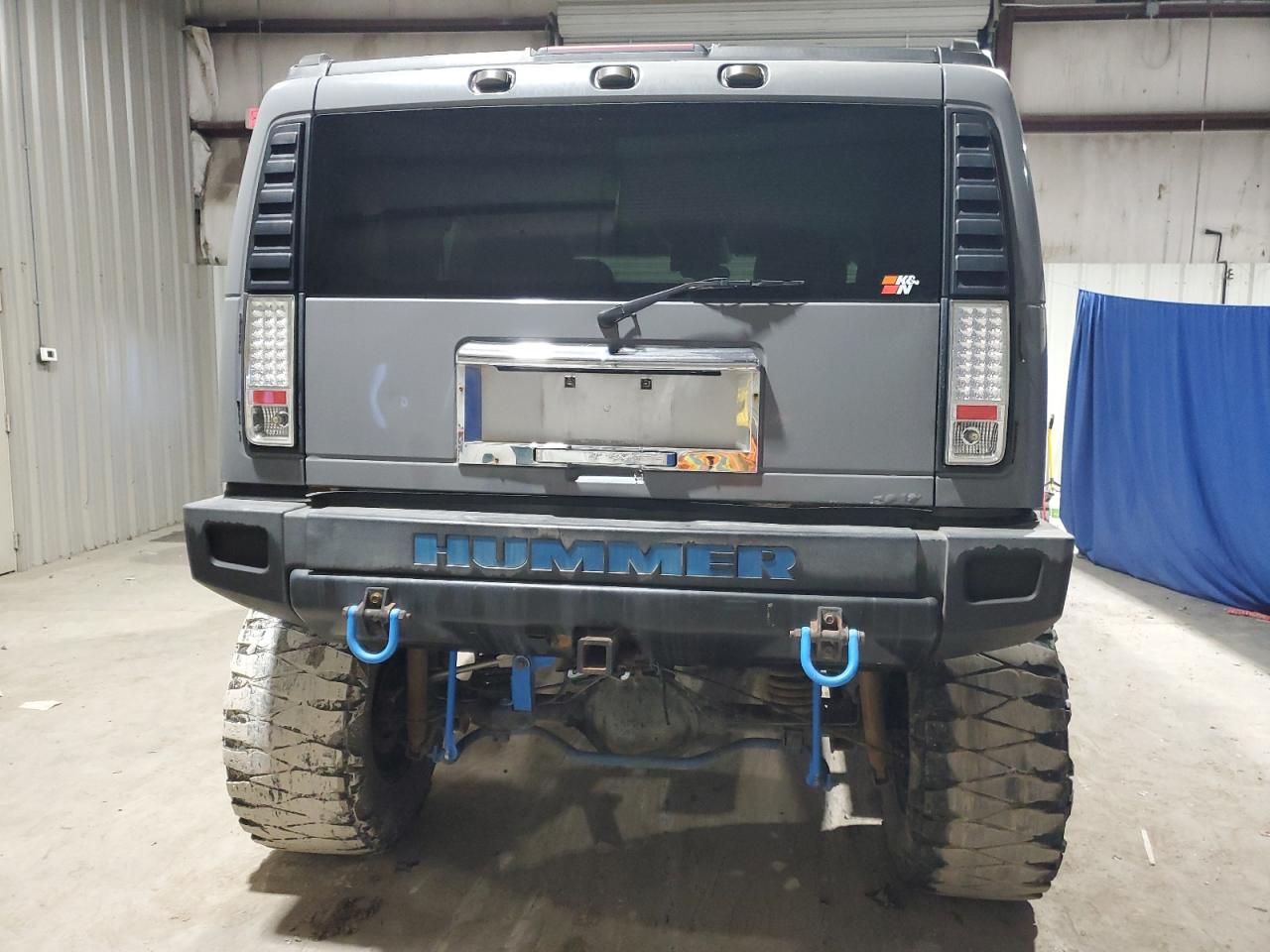 2003 Hummer H2 VIN 5GRGN23UX3H121083 Copart auction photo, minor dent/scratches damage thumbnail 6