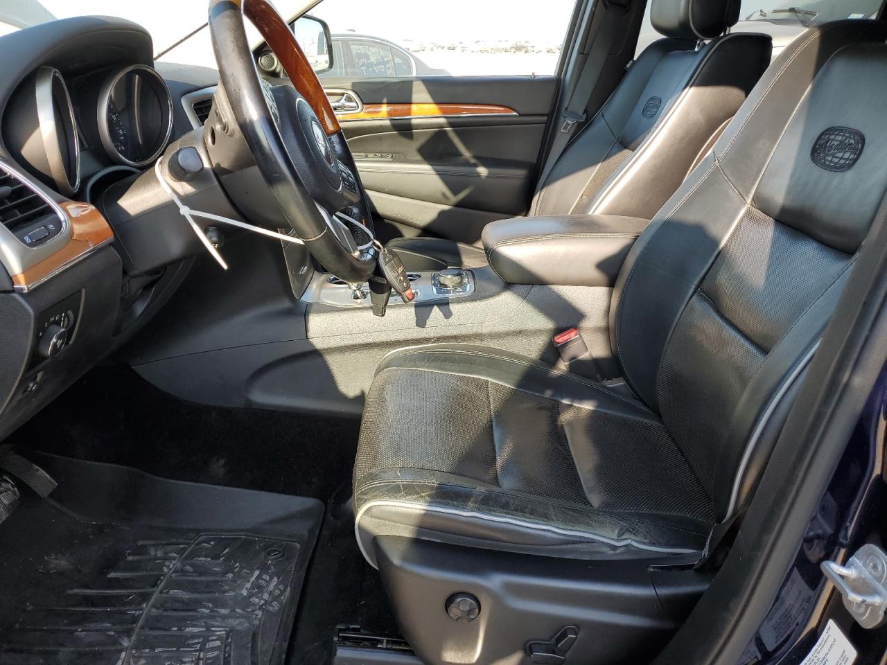 2012 Jeep Grand Cherokee VIN 1C4RJFCG6CC244688 Copart auction photo, hail damage thumbnail 7