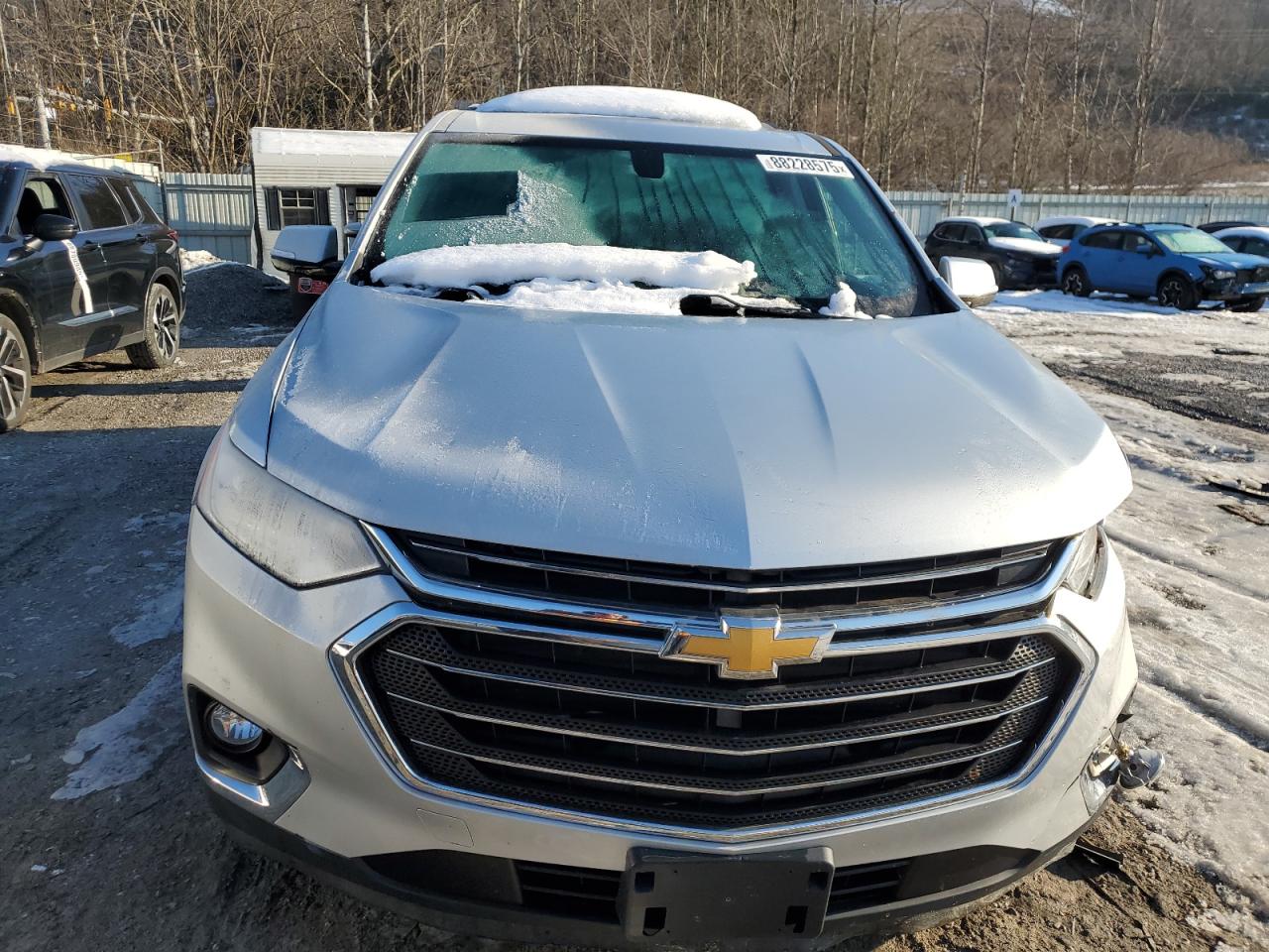 2018 Chevrolet Traverse VIN 1GNEVGKW0JJ146208 Copart auction photo, front end / side damage thumbnail 5