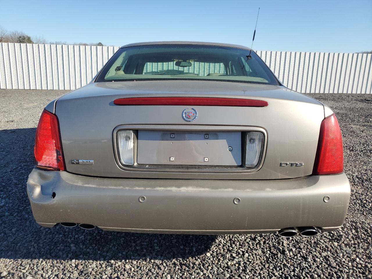 2004 Cadillac De Ville VIN 1G6KF57934U165034 Copart auction photo, rear end / minor dent/scratches damage thumbnail 6