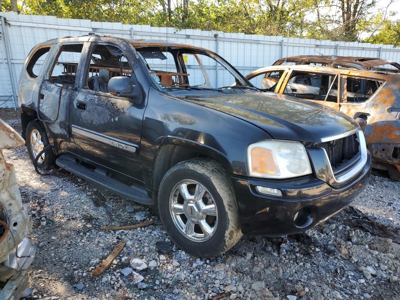 2004 GMC Envoy VIN 1GKDT13S342132387 Copart auction photo, burn damage thumbnail 4