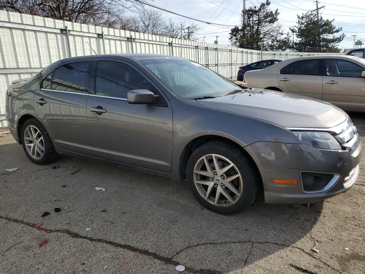 2011 Ford Fusion VIN 3FAHP0JA5BR233807 Copart auction photo, front end / side damage thumbnail 4