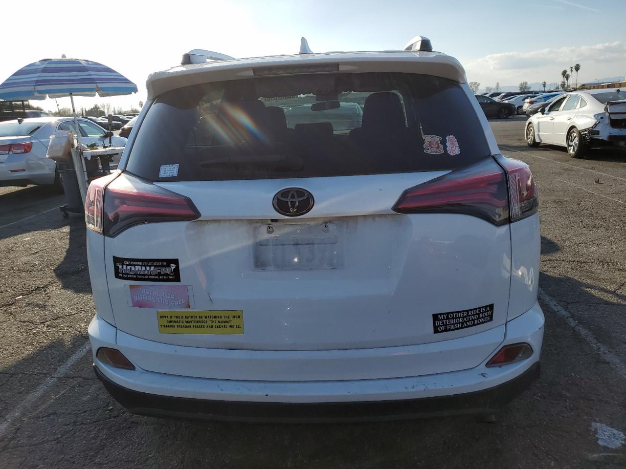 2016 Toyota RAV 4 VIN JTMZFREV2GJ076189 Copart auction photo, front end / minor dent/scratches damage thumbnail 6