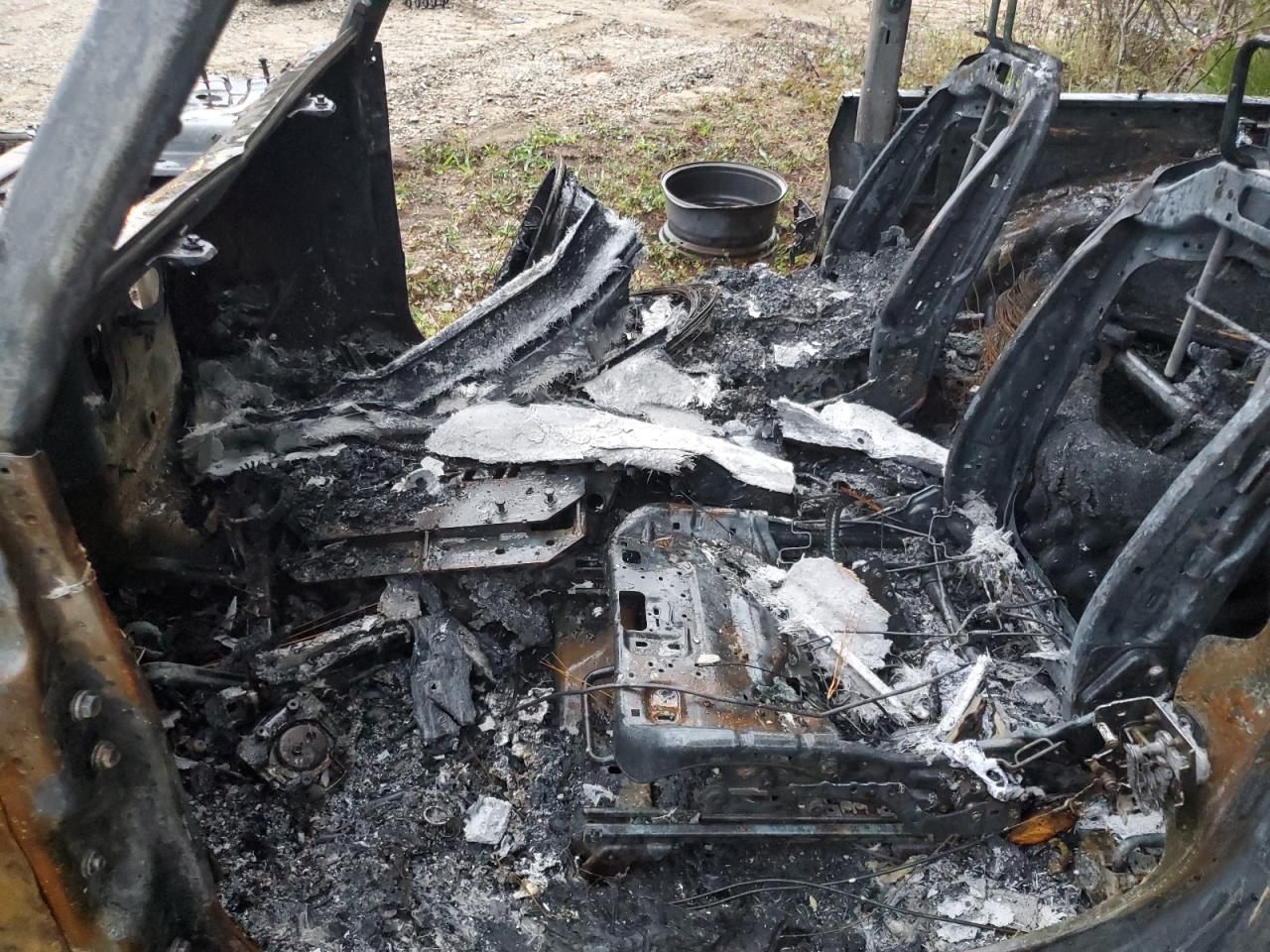 2018 Jeep Wrangler VIN 1C4GJXAN4JW239712 Copart auction photo, burn damage thumbnail 7